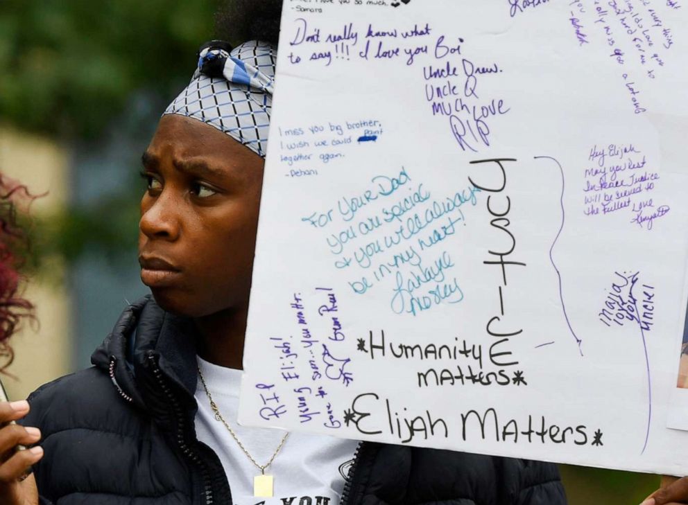 PHOTO: Rashiaa Veal holds a sign of her cousin, Elijah McClain, at a press conference in front of the Aurora Municipal Center, Aurora, Colo., Oct. 01, 2019.
