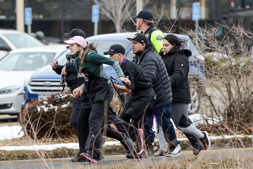 PHOTO: King Soopers employees are led away from an active shooter at the King Soopers grocery store in Boulder, Colo., March 22. 2021.