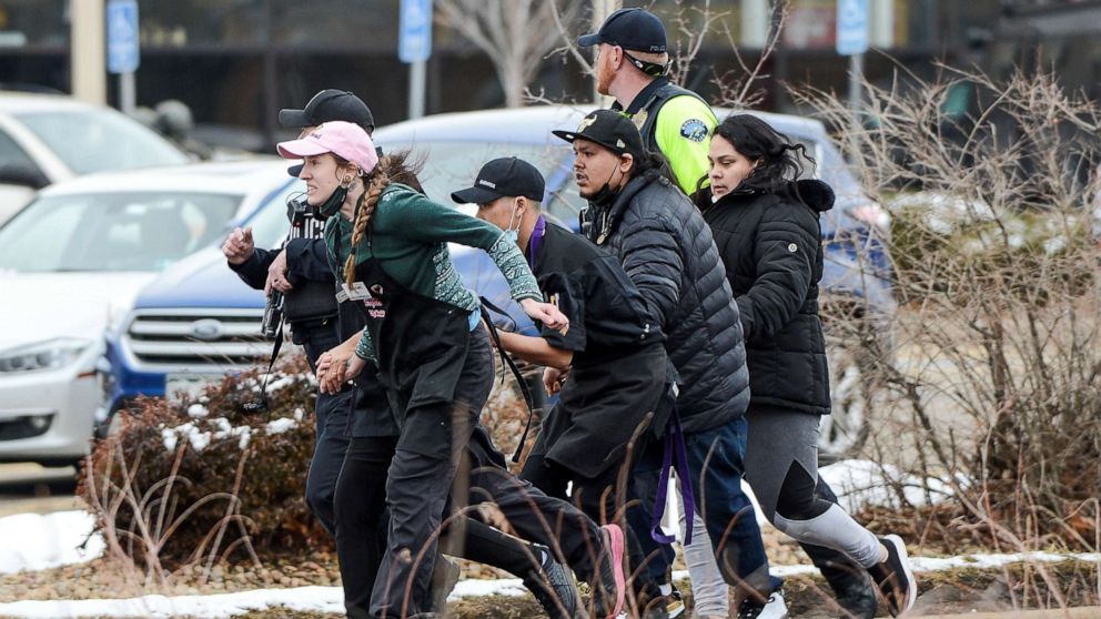 PHOTO: King Soopers employees are led away from an active shooter at the King Soopers grocery store in Boulder, Colo., March 22. 2021.