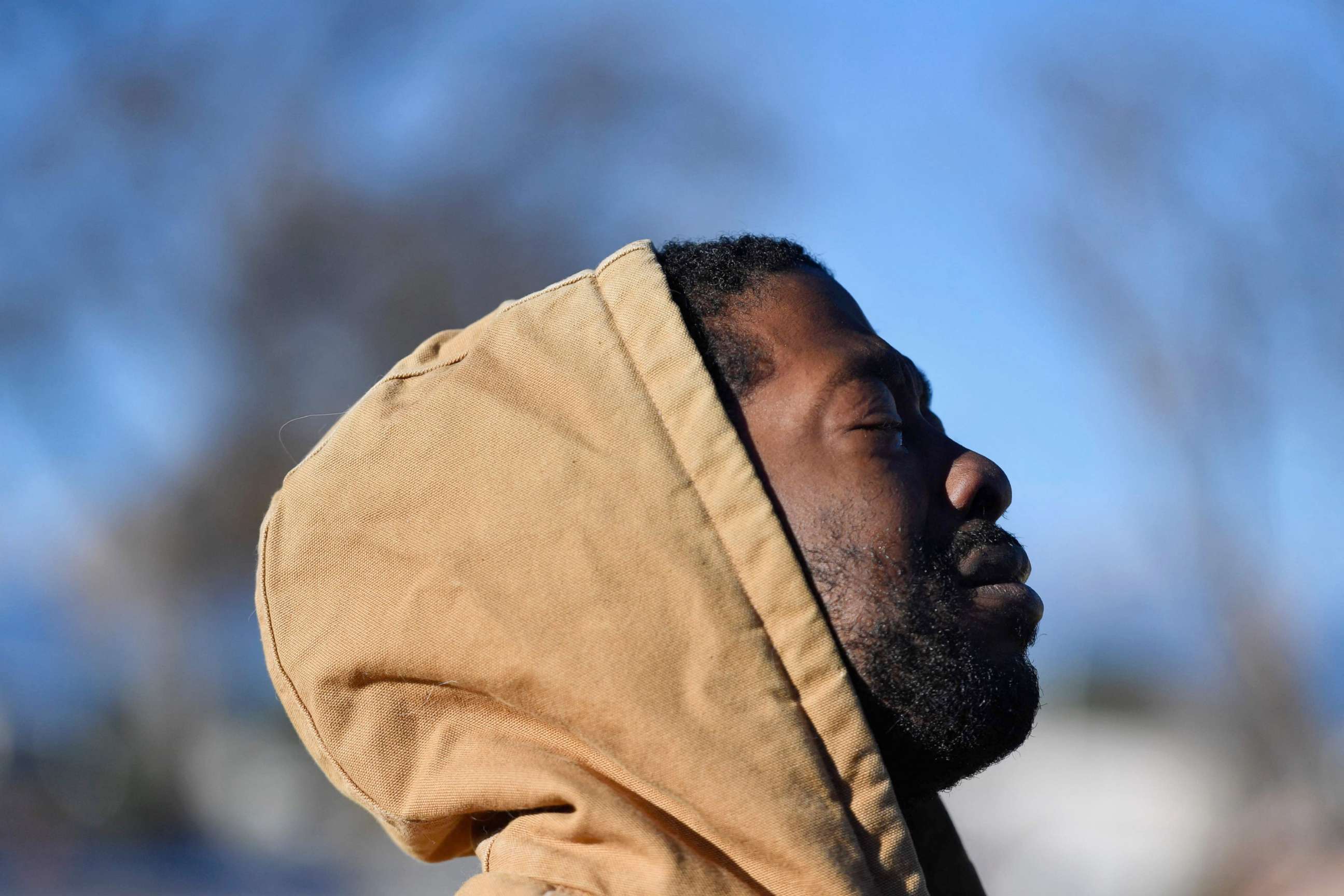 PHOTO: Joshua Thurman, of Colorado Springs, reacts the morning after a mass shooting at Club Q, an LGBTQ nightclub in Colorado Springs, Colorado, on Nov. 20, 2022. Thurman was in the club at the time of the shooting. 