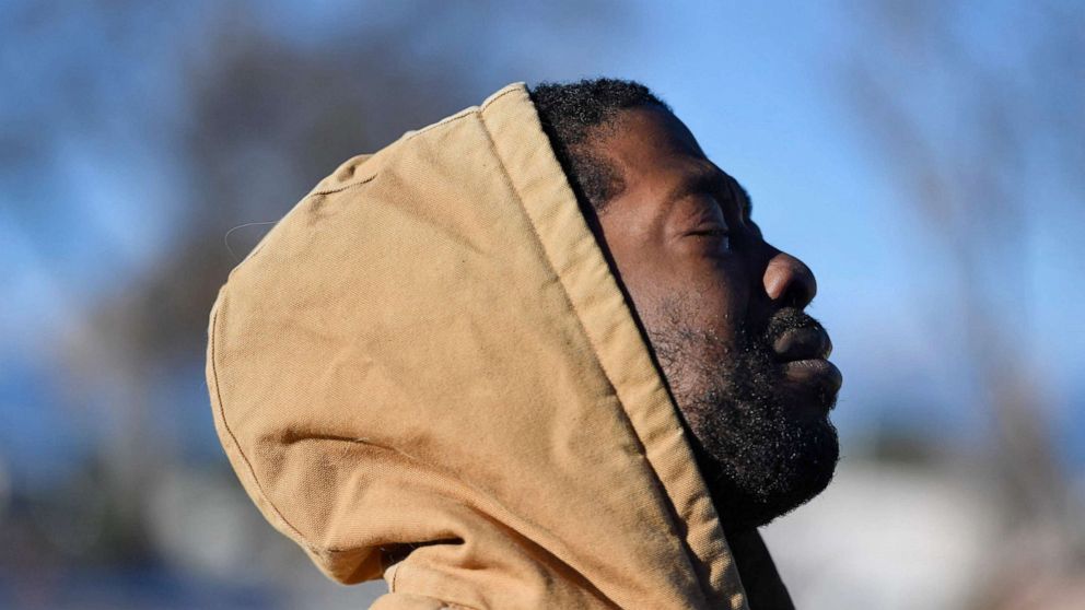 PHOTO: Joshua Thurman, of Colorado Springs, reacts the morning after a mass shooting at Club Q, an LGBTQ nightclub in Colorado Springs, Colorado, on Nov. 20, 2022. Thurman was in the club at the time of the shooting. 