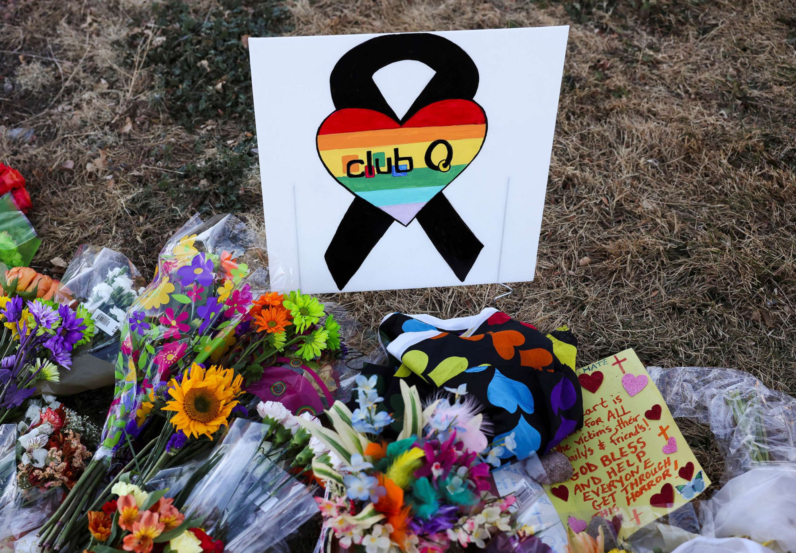 PHOTO: Floral tributes are placed in memory of the victims after a mass shooting at the Club Q gay nightclub in Colorado Springs, Colorado, Nov. 20, 2022.