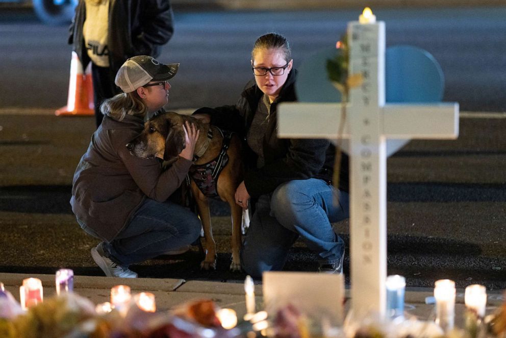 PHOTO: People mourn during a memorial for the victims of the mass shooting at Club Q LGBTQ nightclub in Colorado Springs, Colorado, Nov. 21, 2022.