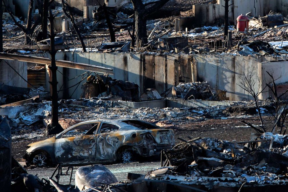PHOTO: Destroyed homes and burned vehicles sit in the aftermath of the Marshall fire in Lousiville, Colo., Jan. 4, 2022.