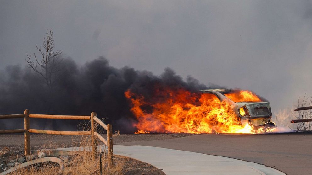 PHOTO:A car burns as a wind-driven wildfire forced evacuation of the Superior suburb of Boulder, Colo., Dec. 30, 2021.