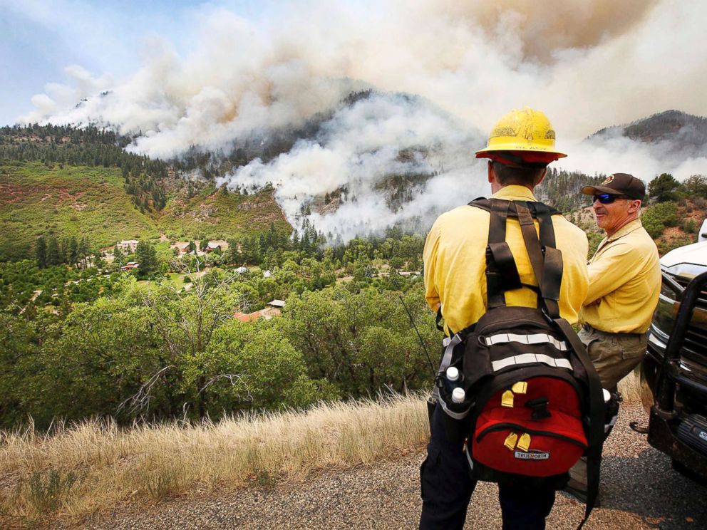 colorado-wildfires3-ap-mem-180613_hpMain_4x3_992 colorado-wildfires3-ap-mem-180613_hpMain_4x3_992 PHOTO: Randy Black, deputy chief of Durango Fire Protection District, and Mike Tombolato, a Rocky Mountain Type One Team member, look over as a fire burns south of County Road 202 during a burnout operation, near Durango, Colo., June 11, 2018. Hot, dry conditions help fuel fast-moving wildfires in the West colorado wildfires3 ap mem 180613 hpMain 4x3 992
