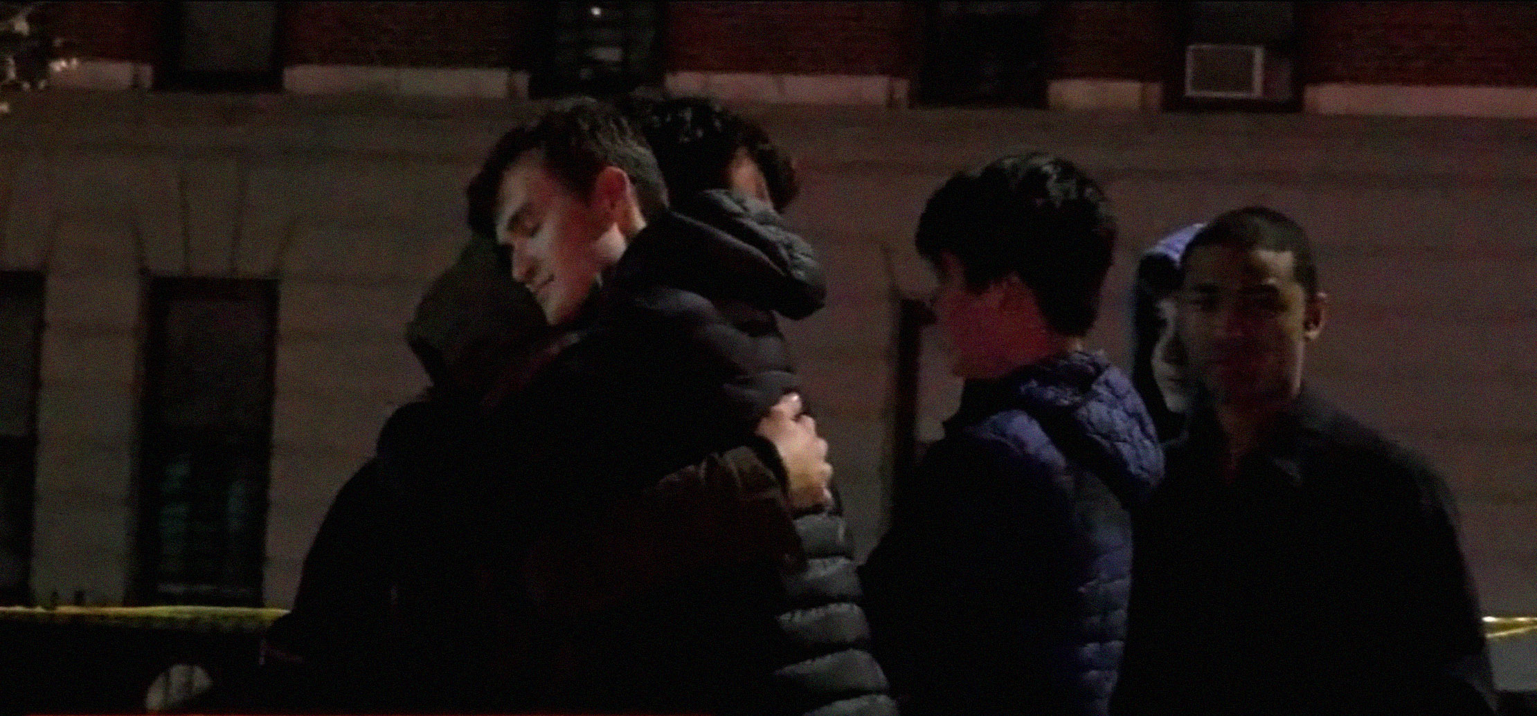 PHOTO: Students embrace at the scene were a Columbia University student was killed and a tourist was wounded in Upper Manhattan, N.Y., Dec. 2, 2021.