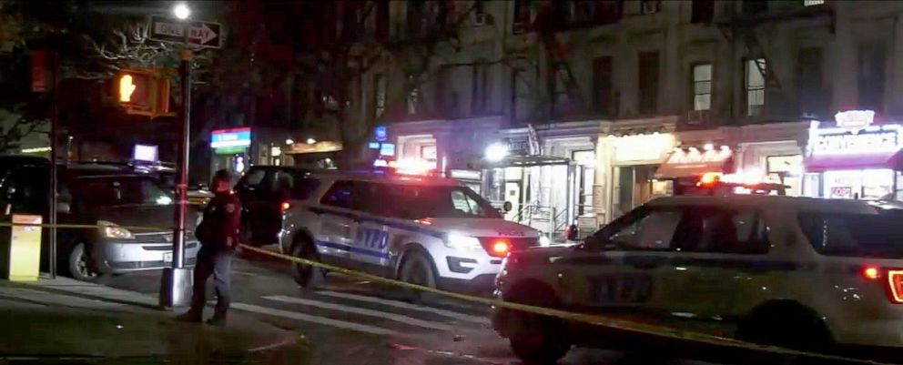 PHOTO: Police secure the scene were a Columbia University student was killed and a tourist was wounded in Upper Manhattan, N.Y., Dec. 2, 2021.