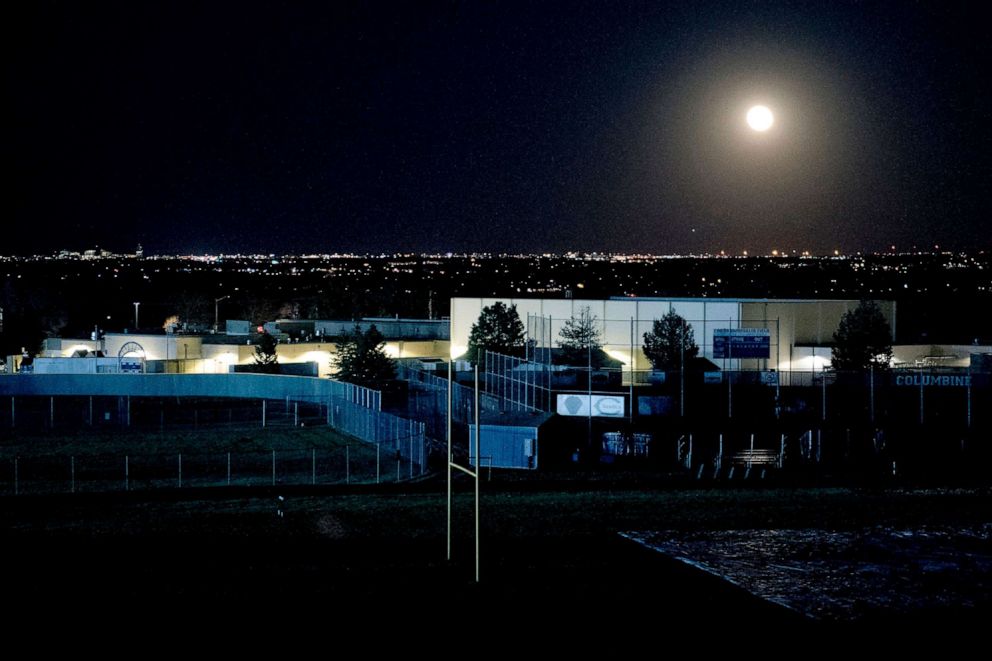 PHOTO: A full moon rises over Columbine High School in Littleton, Colo., April 19, 2019.