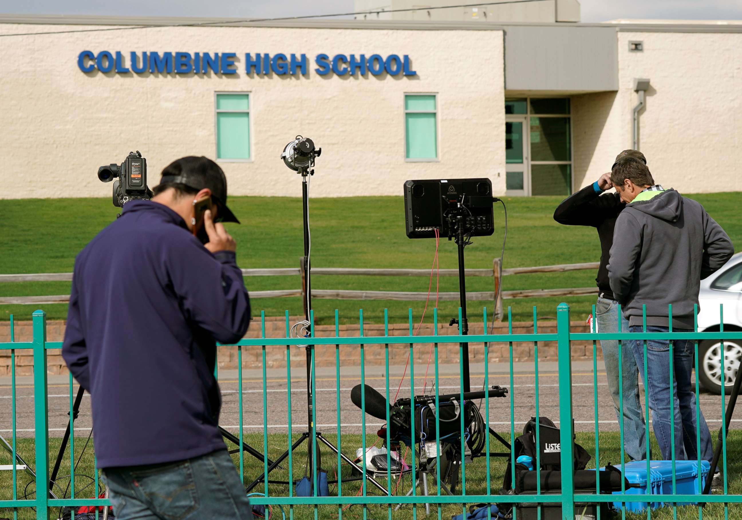 PHOTO: Members of the media gather outside Columbine High School after some Denver area schools closed during a police search for an armed woman "infatuated" with the Columbine massacre, in Littleton, Colo., April 17, 2019.