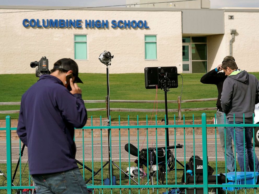 PHOTO: Members of the media gather outside Columbine High School after some Denver area schools closed during a police search for an armed woman infatuated with the Columbine massacre, in Littleton, Colo., April 17, 2019.