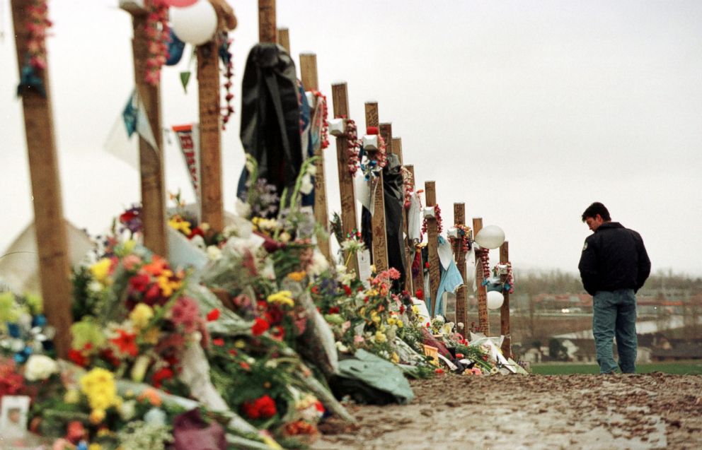 PHOTO: Ryan Foreman of Denvers South Metro Fire Department, visits a memorial for the victims of Columbine High School tragedy in Clement Park, April 30, 1999.