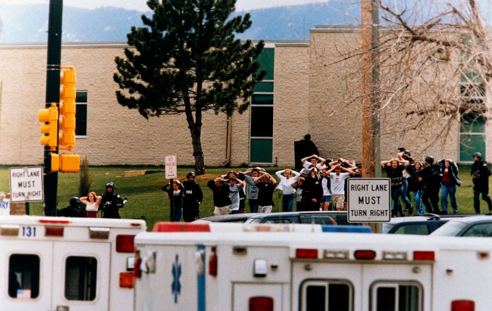 PHOTO: Students run out of the Columbine High School as two gunmen went on a shooting spree in Columbine High School in Littleton, Colo., April 20, 1999.