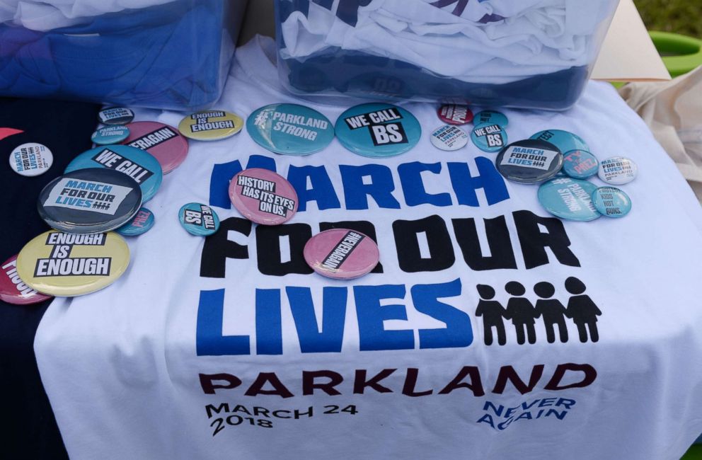 PHOTO: T-shirts and buttons that were available for a March For Our Lives pep rally at Stoneman Douglas High School, Parkland, Florida, March. 20, 2018. 