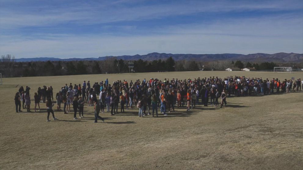 PHOTO: Columbine High School students walk out of classes to demand stricter gun laws as part of a nationwide protest on March 14, 2018, in Littleton, Colo., one month after the Florida high school shootings.