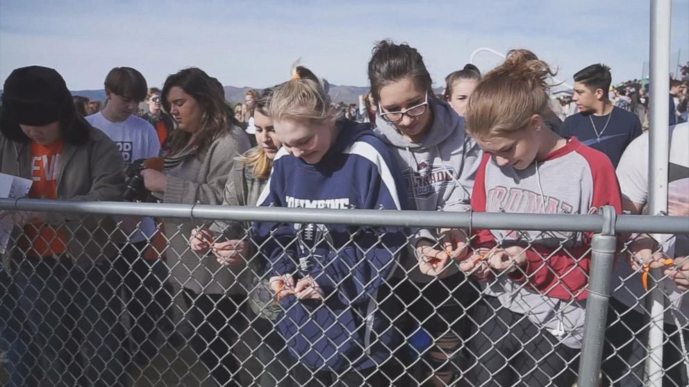 PHOTO: Columbine High School students walk out of classes to demand stricter gun laws as part of a nationwide protest on March 14, 2018, in Littleton, Colo., one month after the Florida high school shootings.