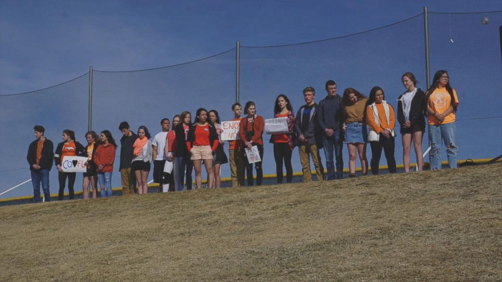 PHOTO: Columbine High School students walk out of classes to demand stricter gun laws as part of a nationwide protest on March 14, 2018, in Littleton, Colo., one month after the Florida high school shootings.