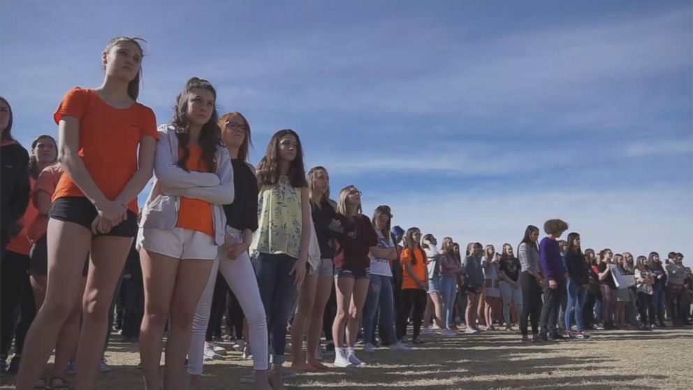 PHOTO: Columbine High School students walk out of classes to demand stricter gun laws as part of a nationwide protest on March 14, 2018, in Littleton, Colo., one month after the Florida high school shootings.