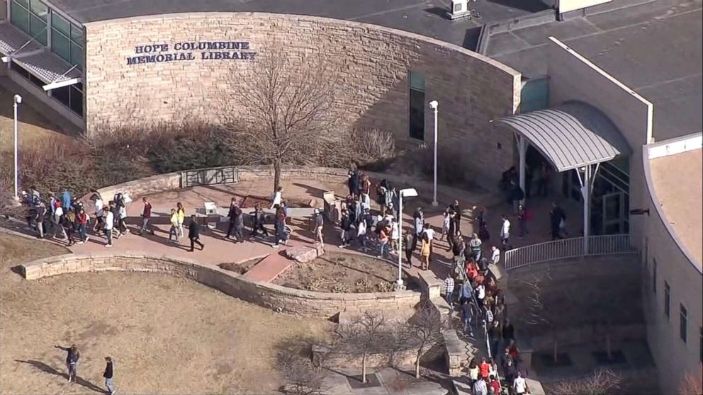 PHOTO: Students at Columbine High school in Littleton, Colo., walk out of classes to demand stricter gun laws as part of a nationwide protest on March 14, 2018, one month after the Parkland high school shootings in Florida.