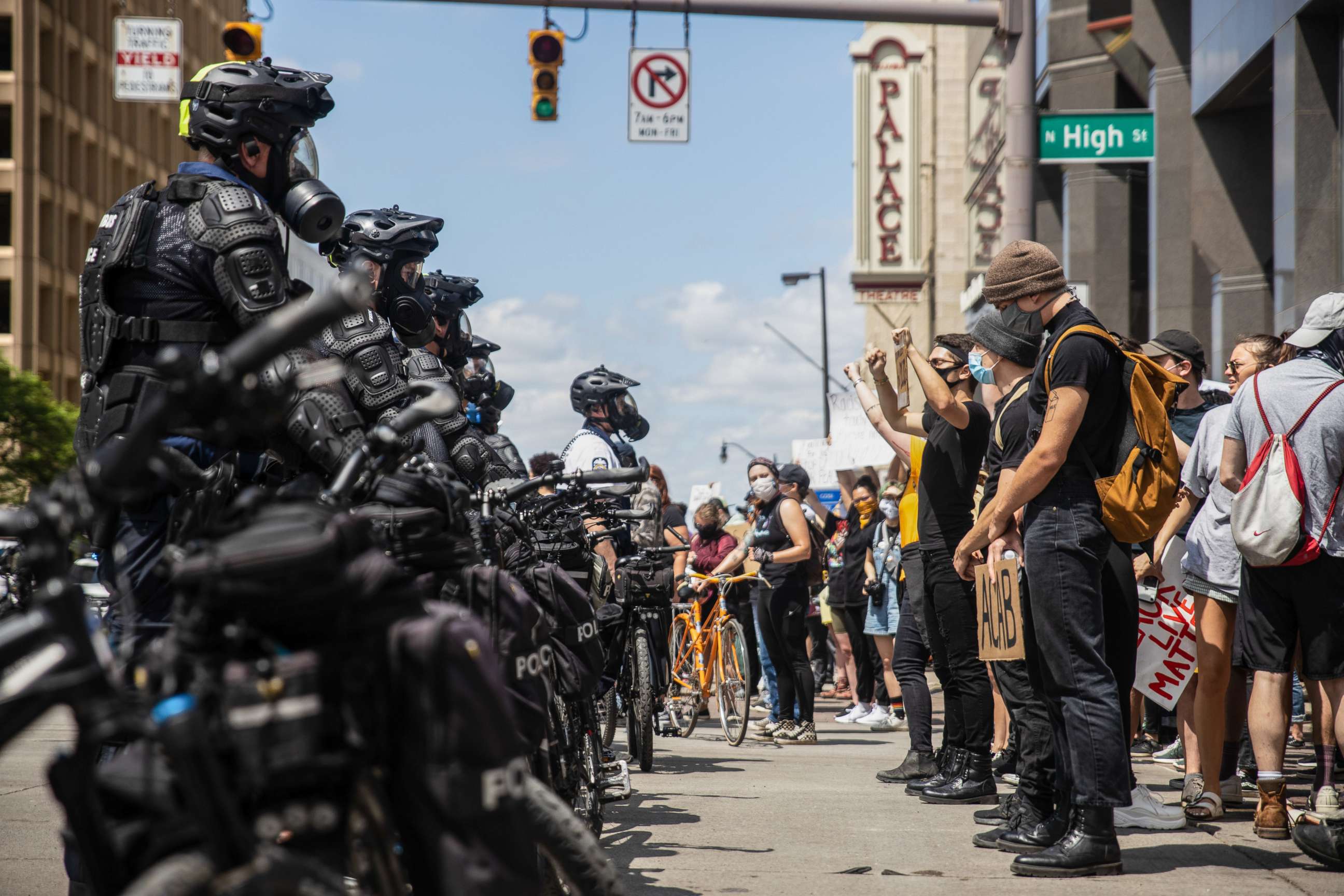 PHOTO: Protesters confront police officers standing in the middle of the street in Columbus, Ohio, during a demonstration against the murder of George Floyd under police custody, May 30, 2020.