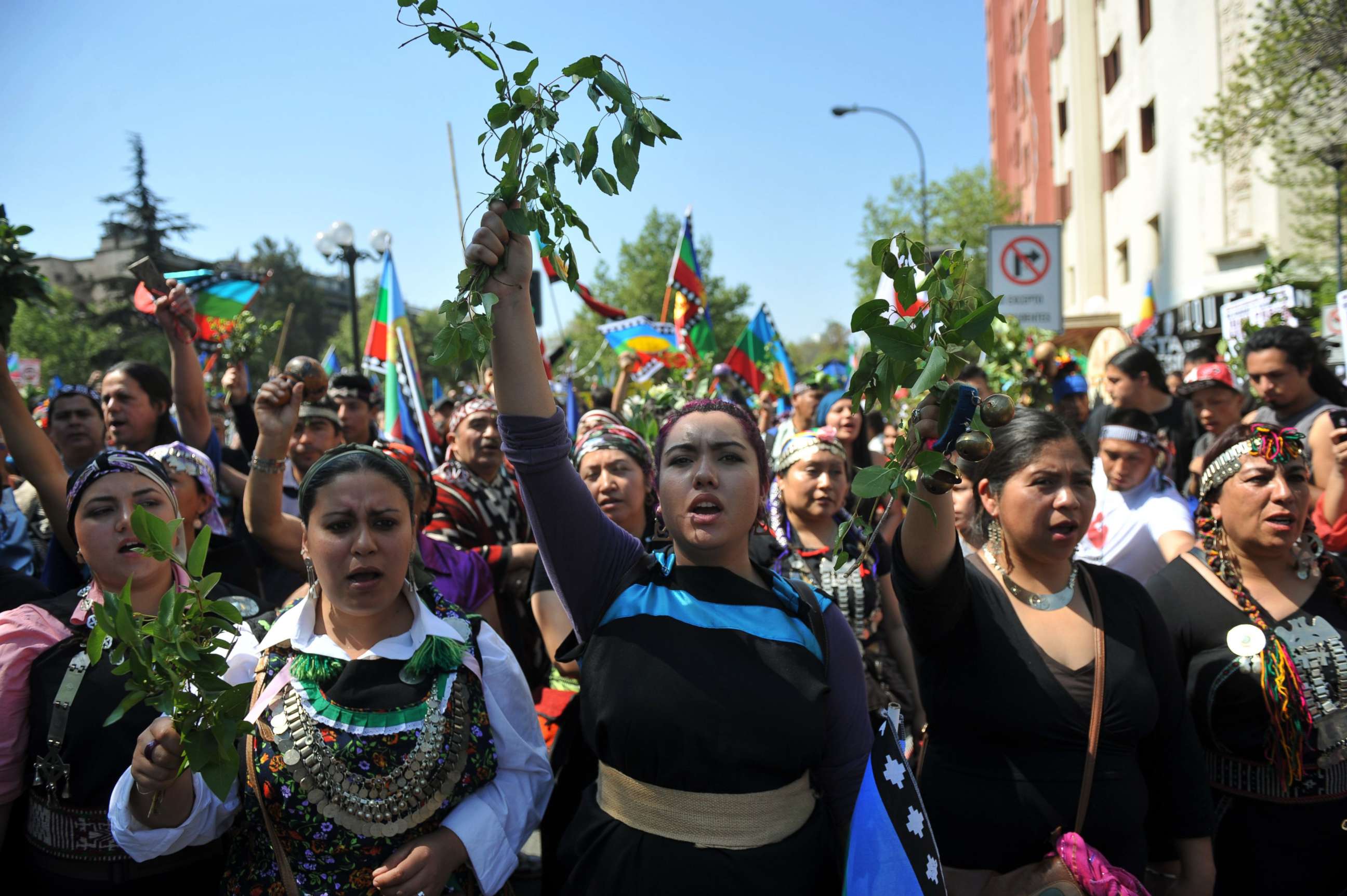 PHOTO: Mapuche indigenous people march in protest in downtown Santiago, on Oct. 12, 2013, during the commemorations for Columbus Day.