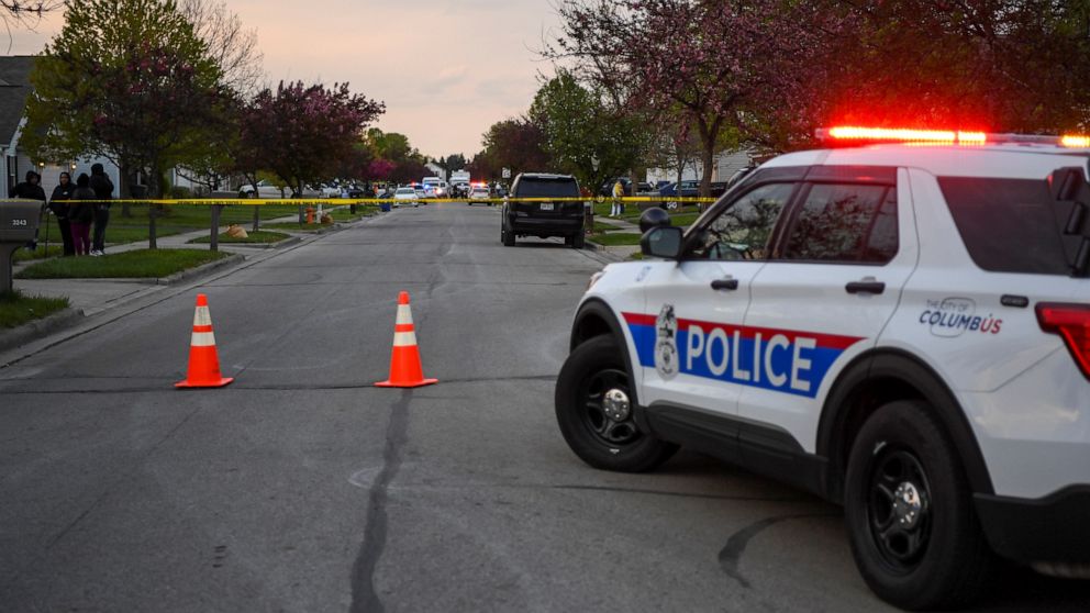 PHOTO: Investigators work at the scene where a fatal shooting by a police officer occurred in Columbus, Ohio, April 20, 2021.