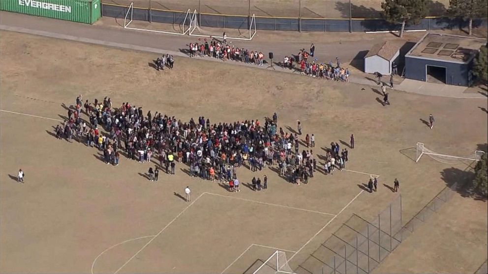 PHOTO: Students at Columbine High school in Littleton, Colo., walk out of classes to demand stricter gun laws as part of a nationwide protest on March 14, 2018, one month after the Parkland high school shootings in Florida.