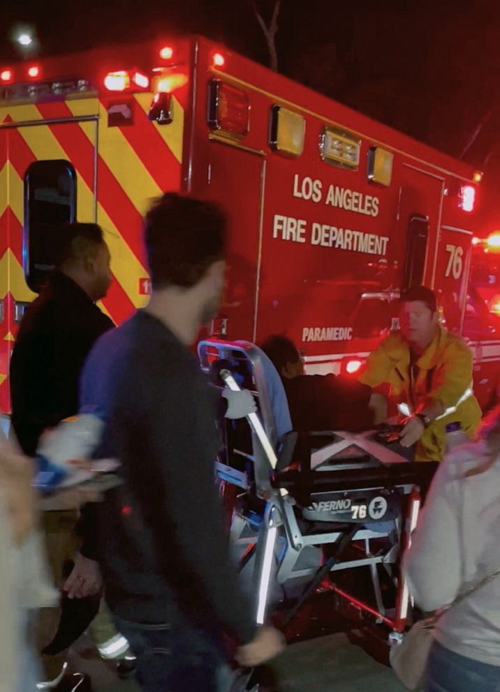 PHOTO: A man is transported into an ambulance at the Hollywood Bowl, in Los Angeles, May 3, 2022.