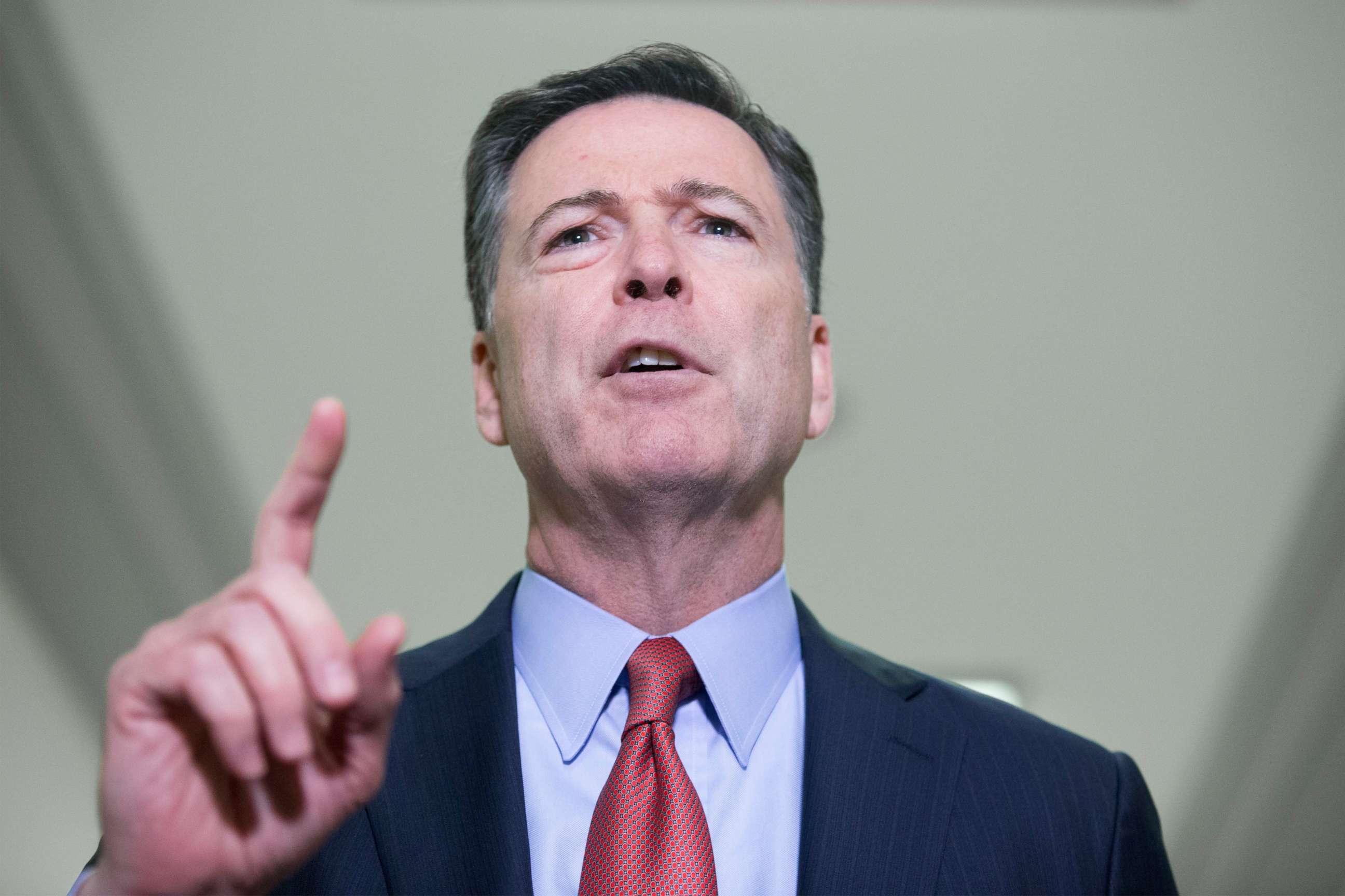 PHOTO: Former FBI Director James Comey delivers remarks to members of the media after finishing his testimony before members of the House Judiciary and House Oversight and Government Reform Committees, on Capitol Hill in Washington, Dec. 17, 2018.