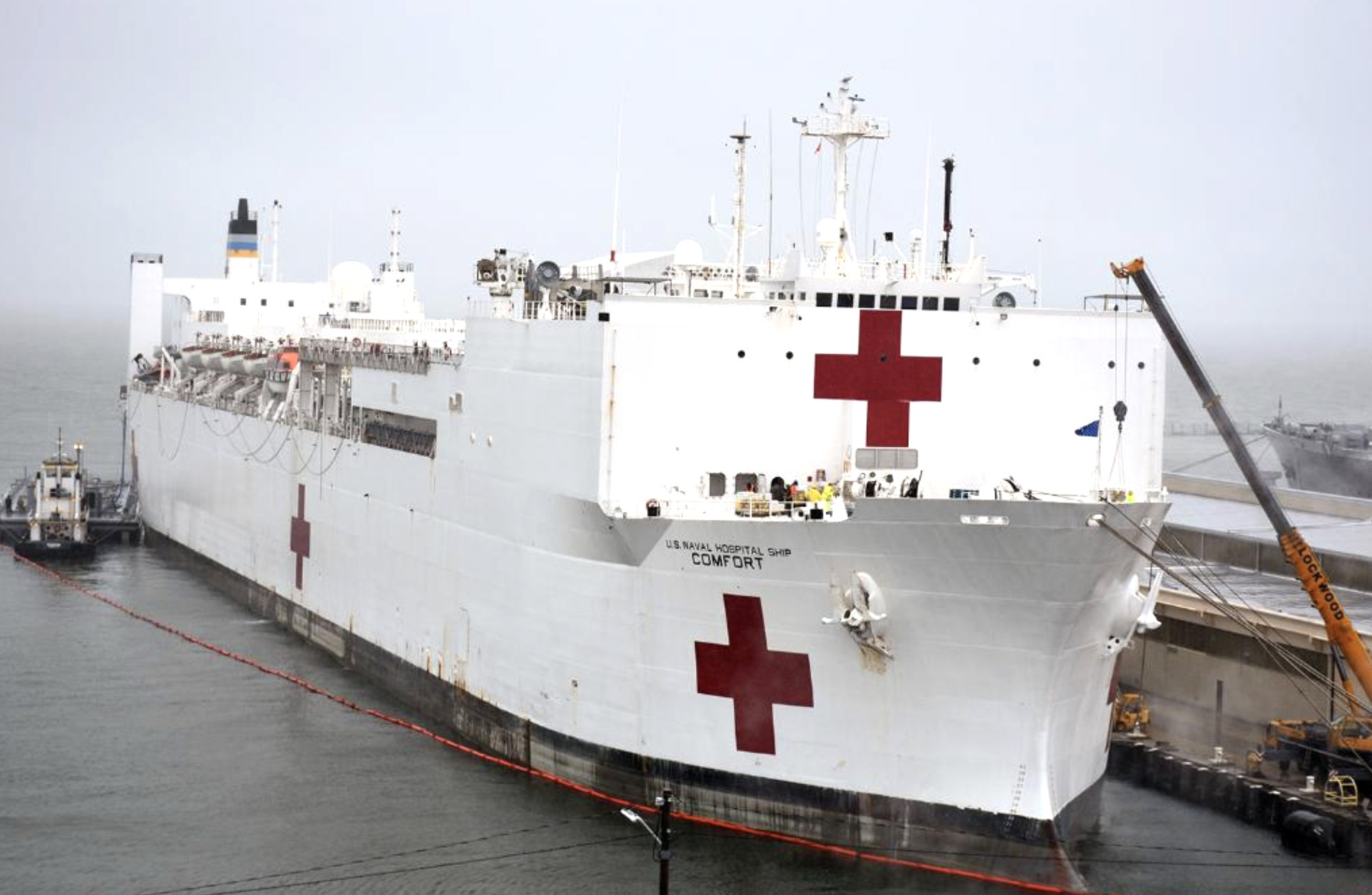 PHOTO: The USNS Comfort takes on fuel and supplies in preparation to deploy in support of the nation's coronavirus outbreak, March 25, 2020.