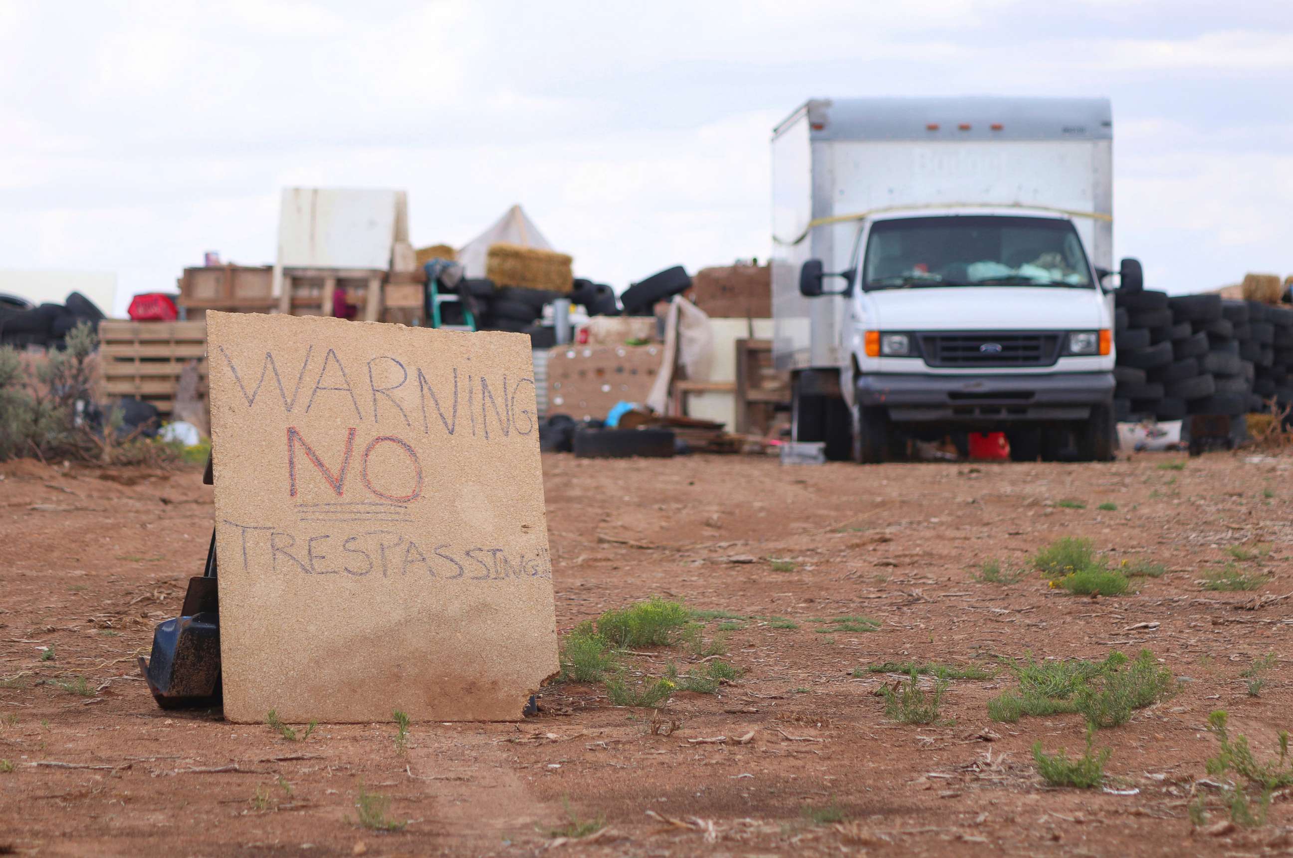PHOTO: A "no trespassing" sign outside of the location where people camped near Amalia, N.M., Aug. 5, 2018. 