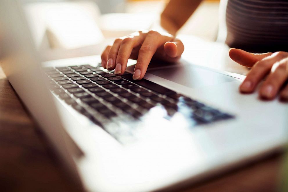 PHOTO: A person uses a laptop in this stock photo.