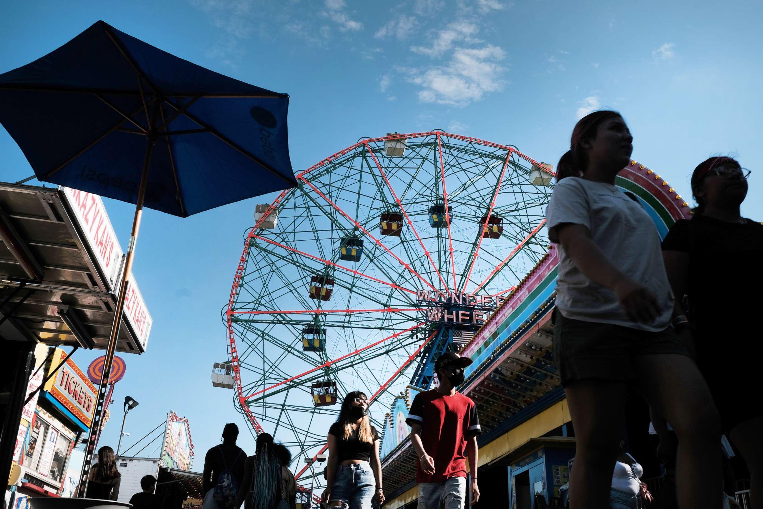 PHOTO: People enjoy a day at Coney Island in the Brooklyn borough of New York, June 29, 2022.