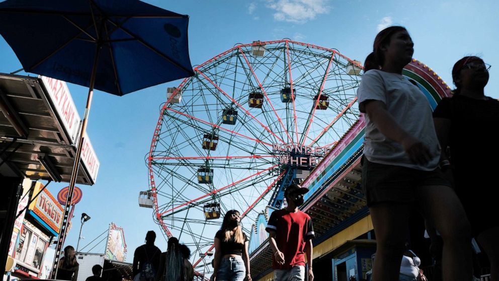 PHOTO: People enjoy a day at Coney Island in the Brooklyn borough of New York, June 29, 2022.