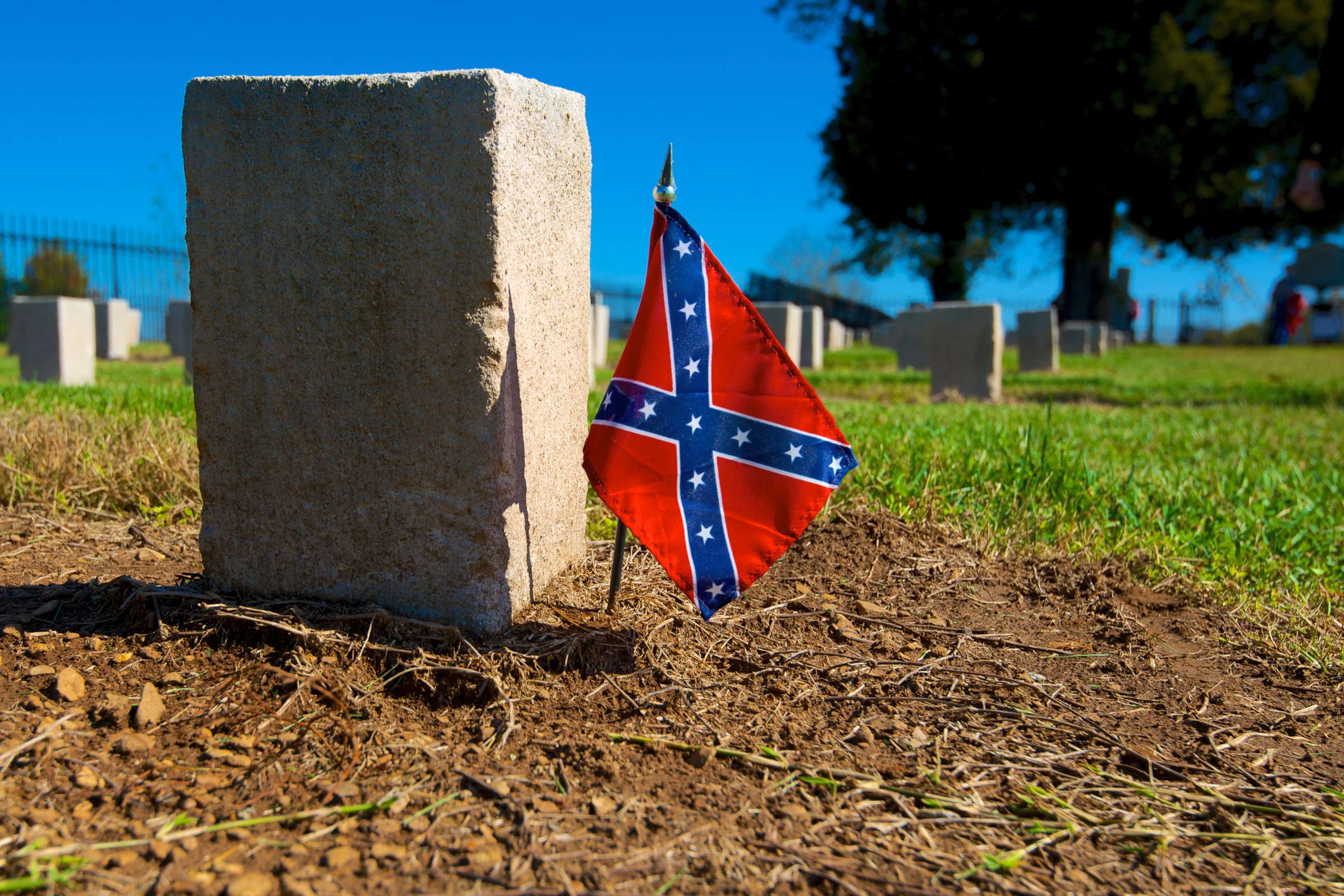 PHOTO: A confederate flag is put next to a gravestone in a cemetery, in this undated file photo.