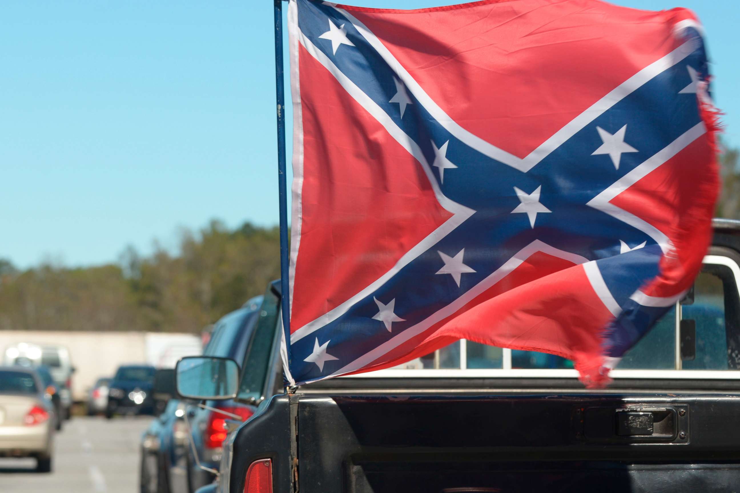 PHOTO: A Confederate flag, attached to the back of a pick up truck, waves in the winds in Georgia.