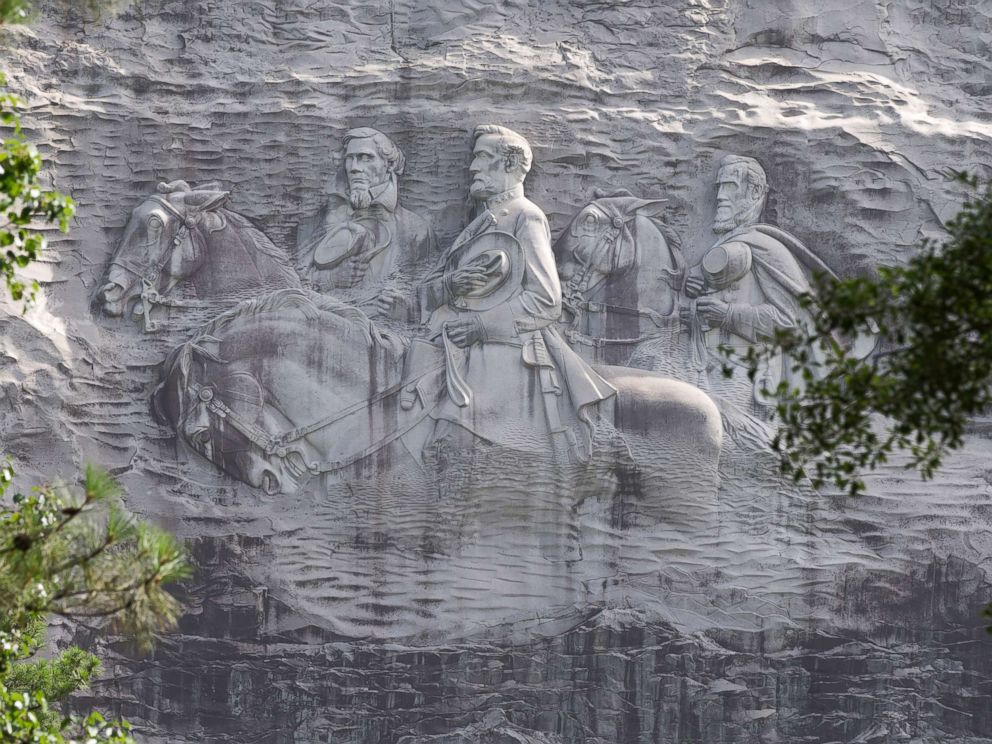 PHOTO: This June 23, 2015, file photo shows a carving depicting confederates Stonewall Jackson, Robert E. Lee and Jefferson Davis, in Stone Mountain, Ga.