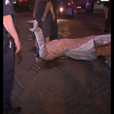 Police were called to the scene after protesters tore down the statue in Virginia's capital.