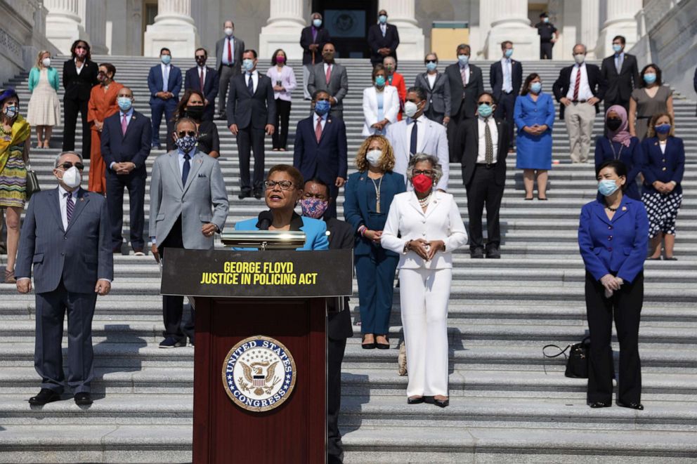 PHOTO: Rep. Karen Bass speaks as other House Democrats listen during an event on police reform, June 25, 2020, in front of the U.S. Capitol in Washington, D.C.