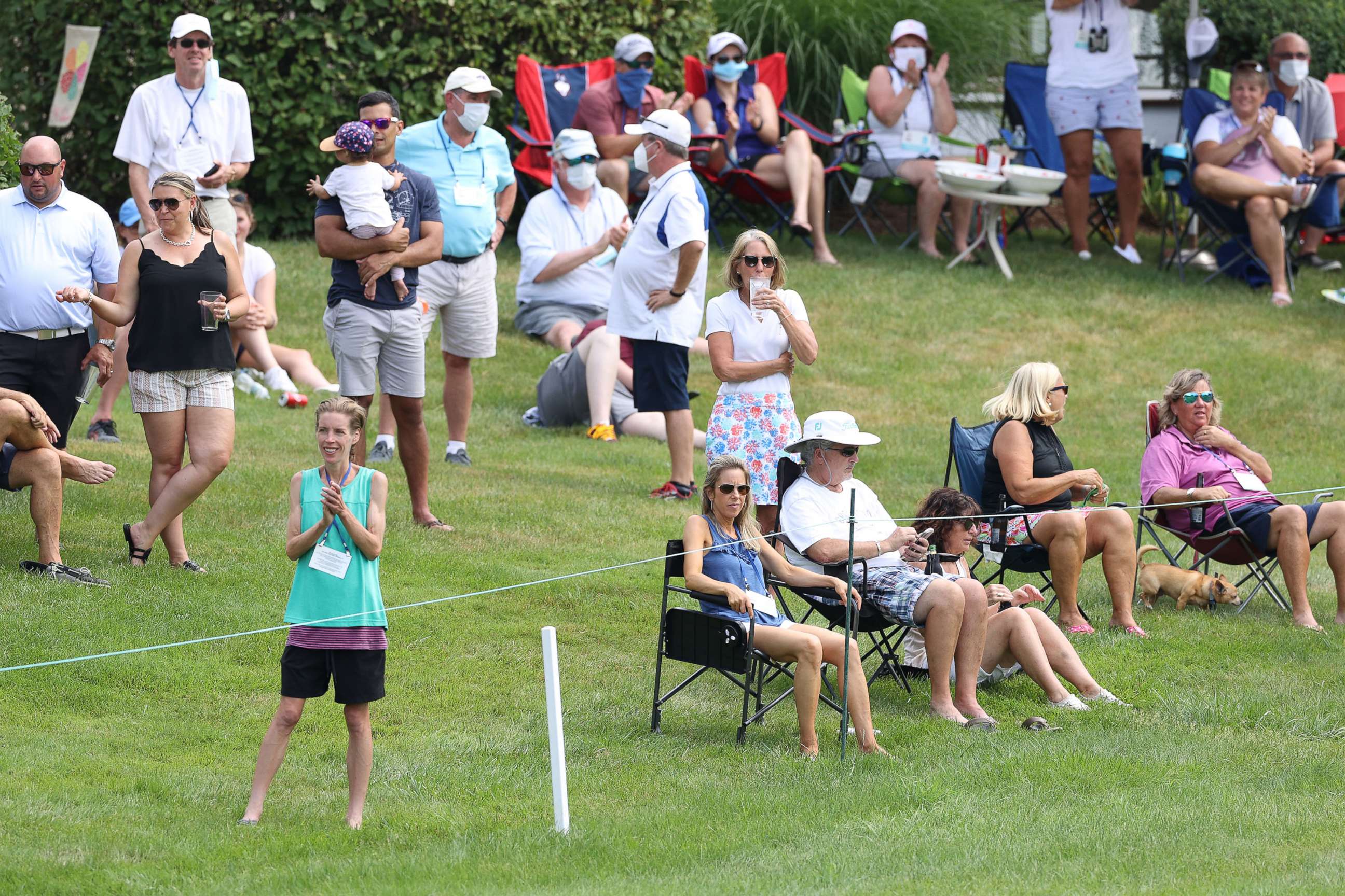 PHOTO: Course residents watch play on the eighth green during the final round of the Travelers Championship at TPC River Highlands on June 28, 2020, in Cromwell, Conn.