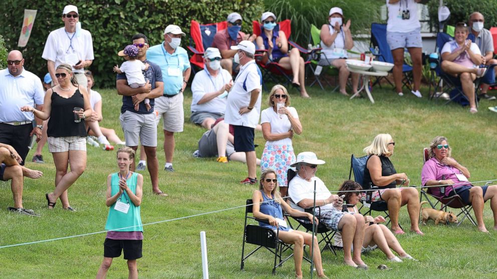 PHOTO: Course residents watch play on the eighth green during the final round of the Travelers Championship at TPC River Highlands on June 28, 2020, in Cromwell, Conn.
