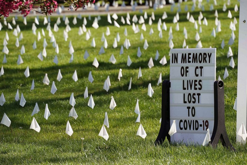 PHOTO: Thousands of white markers, are seen on the lawn, placed by Rev. Patrick Collins, at the First Congregational Church of Greenwich, May 4,2020, to honor the many lives lost as result of the COVID-19 pandemic in Old Greenwich, Ct.