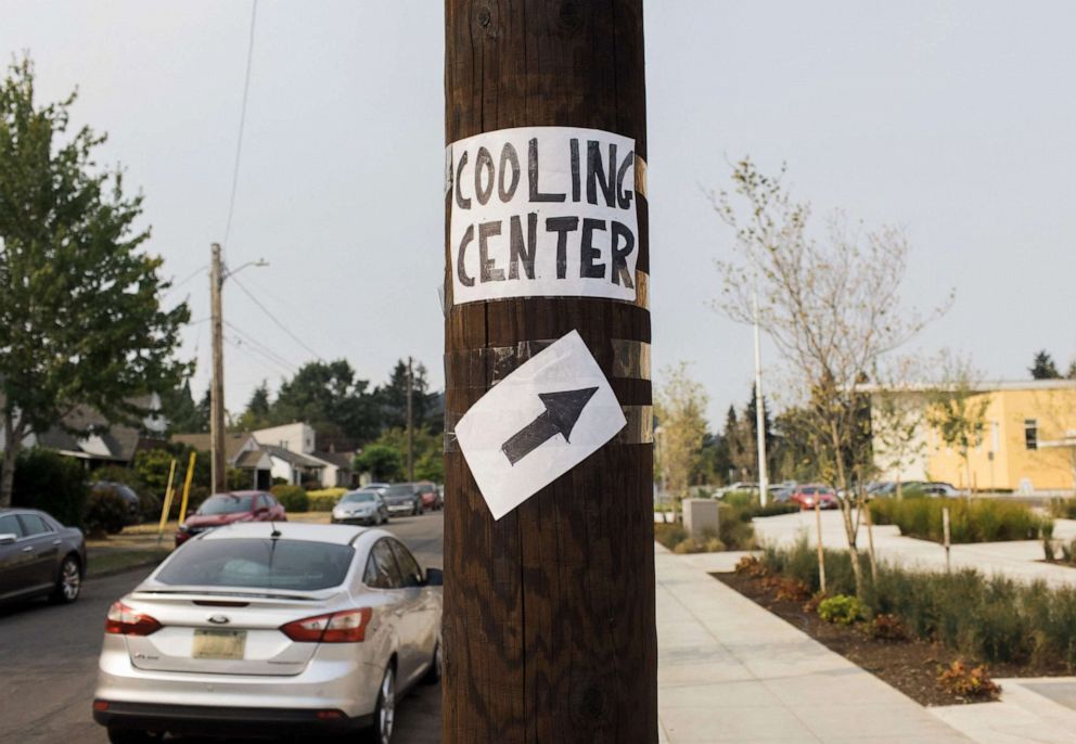 PHOTO: A sign gives direction to a cooling center at Kellogg Middle School in Portland, Ore. on Aug. 14, 2021.
