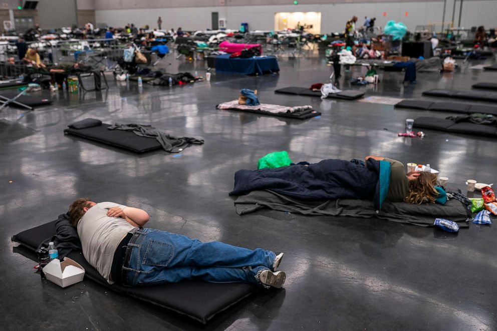 PHOTO: Residents fill a cooling center with a capacity of about 300 people at the Oregon Convention Center, June 27, 2021, in Portland, Oregon, during a record breaking  heatwave.