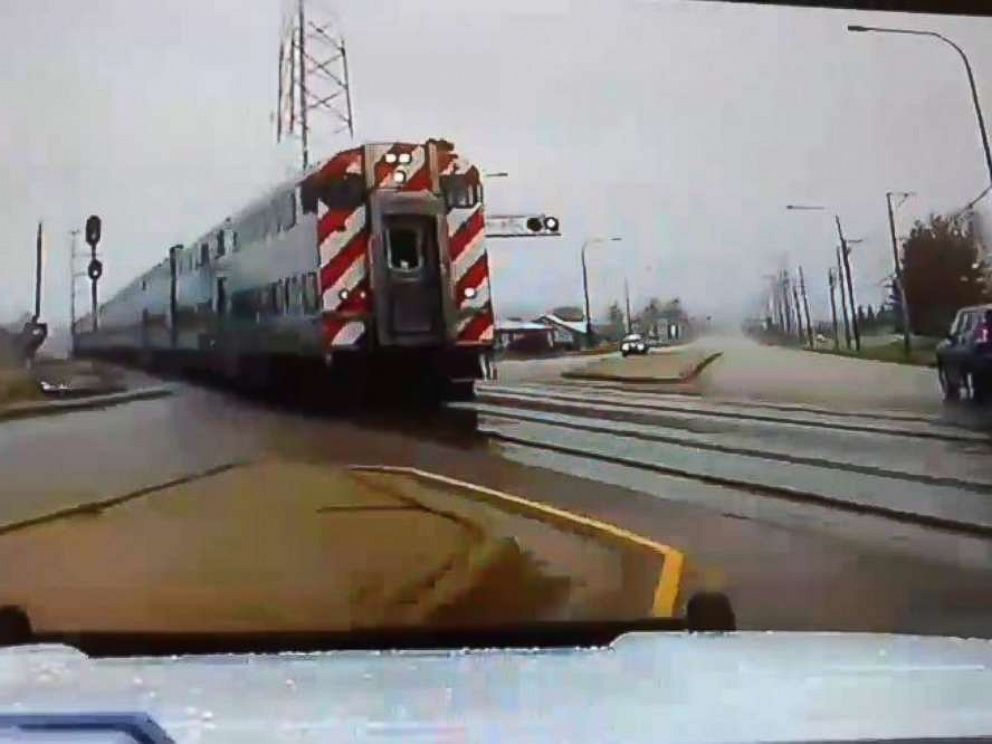 PHOTO: A police officer in Mokena, Ill., narrowly avoided tragedy when he swerved to avoid being hit by a commuter train due to a technical malfunction in November 2018.