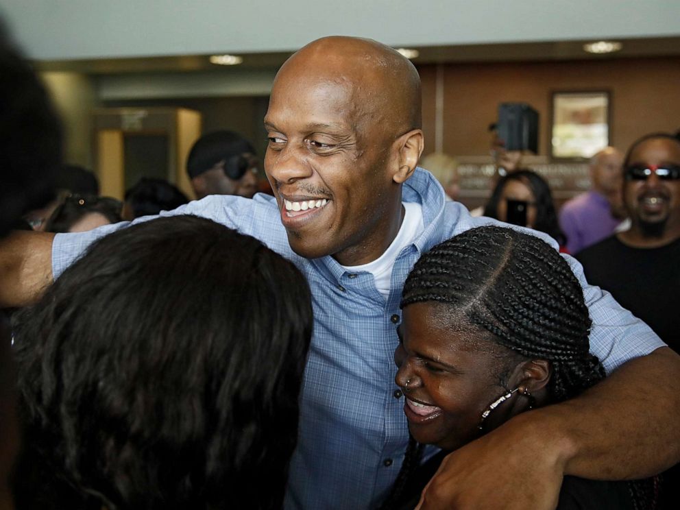 PHOTO: Corey Atchison is greeted by his sisters including Laura Scott, right, as he is freed from the David L. Moss Criminal Justice Center after Judge Sharon Holmes declared him innocent in a 1991 murder case, in Tulsa, Okla., July 16, 2019.