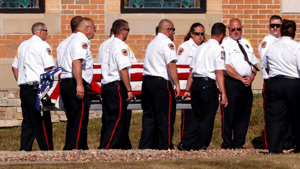 PHOTO: Fire fighters carry the casket of Corey Comperatore on the day of his private funeral at Cabot Church in Butler, Pa., on July 19, 2024.