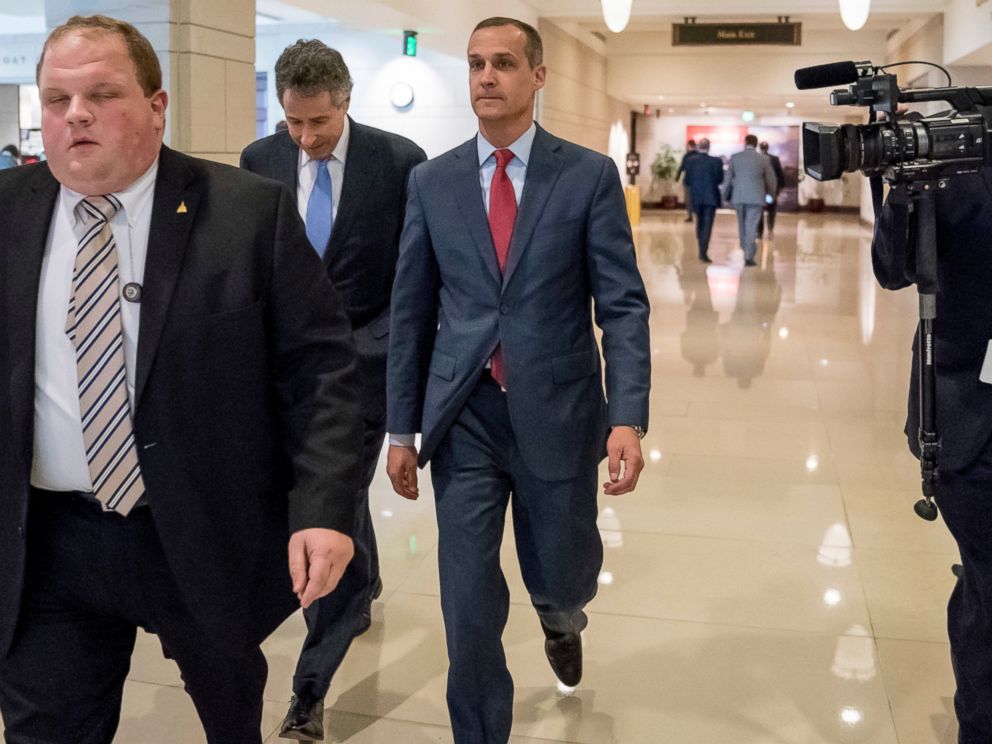 Former Trump campaign manager Cory Lewandowski, center, and his lawyer Peter Chavkin, second from left, arrive to meet behind closed doors with the House Intelligence Committee, at the Capitol in Washington, Thursday, March 8, 2018.