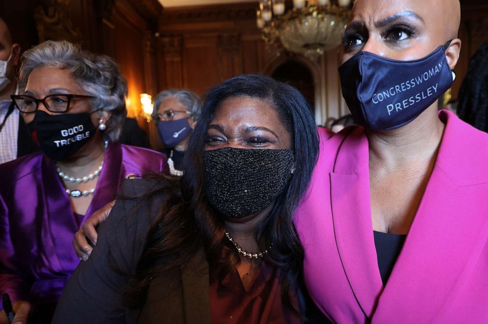 PHOTO: Rep. Cori Bush and Rep. Ayanna Pressley walk with their arms around each other to a news conference following the verdict in the Derick Chauvin murder trial at the U.S. Capitol on April 20, 2021, in Washington, D.C.
