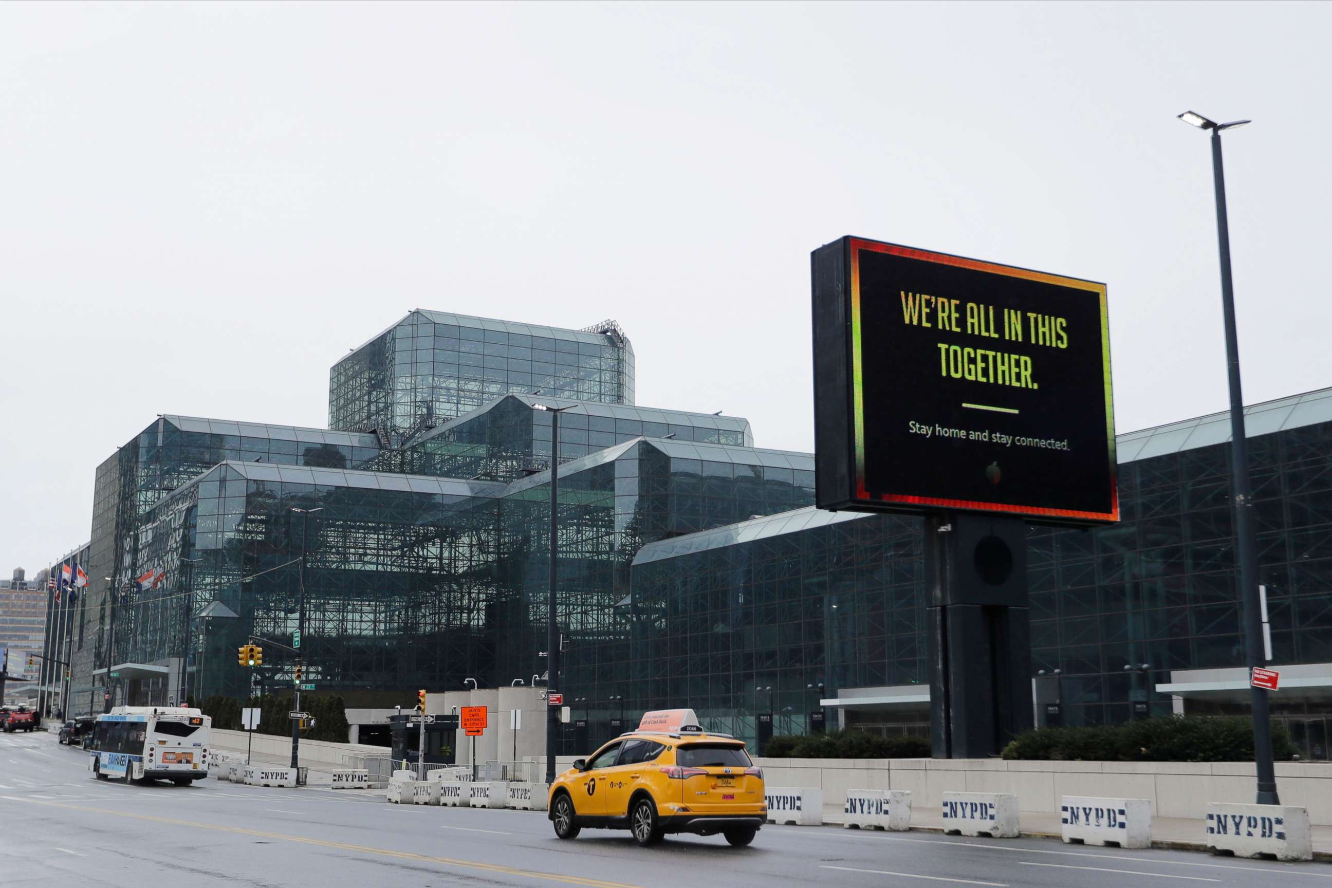 PHOTO: Cars pass the Jacob Javits Convention Center Friday, April 3, 2020, in New York.